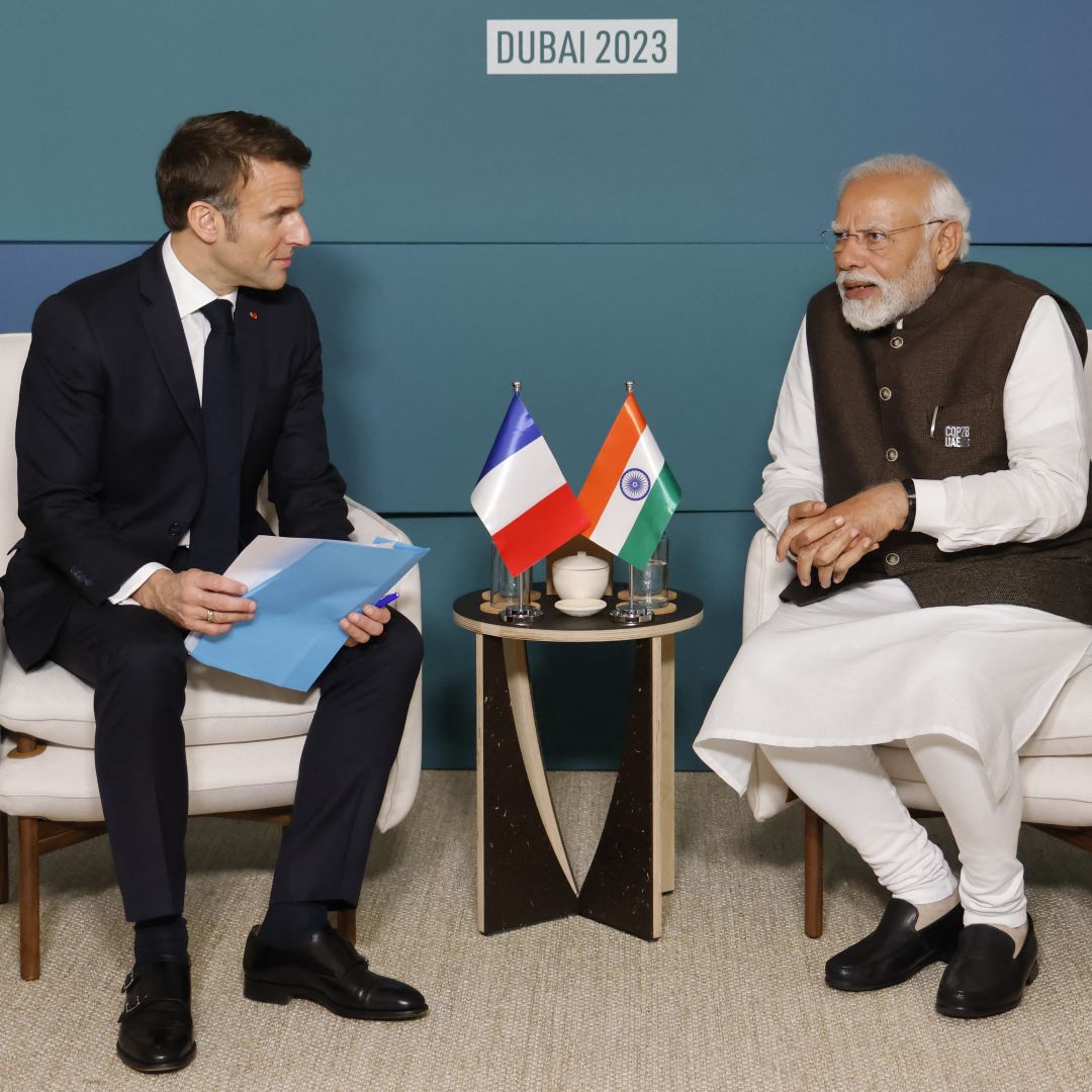 India Prime Minister Narendra Modi (R) meets with French President Emmanuel Macron on Dec. 1, 2023, in Dubai.