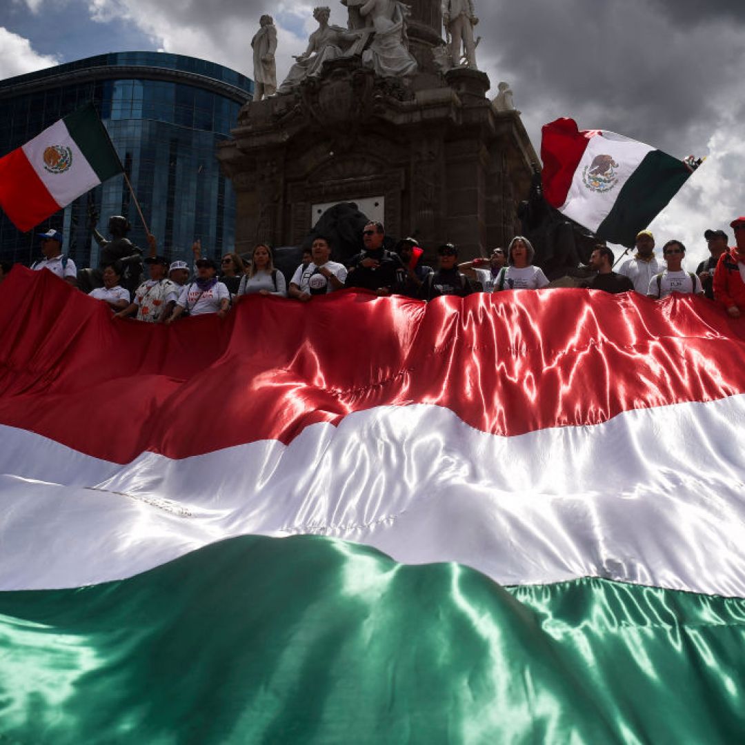 Members of the National Association of Magistrates and District Judges hold a massive Mexican flag during a protest in Mexico City, Mexico, on Sept. 11, 2024, after Mexico's Senate approved controversial judicial reforms. Members of the National Association of Magistrates and District Judges hold a massive Mexican flag during a protest in Mexico City, Mexico, on Sept. 11, 2024, after Mexico's Senate approved controversial judicial reforms.
