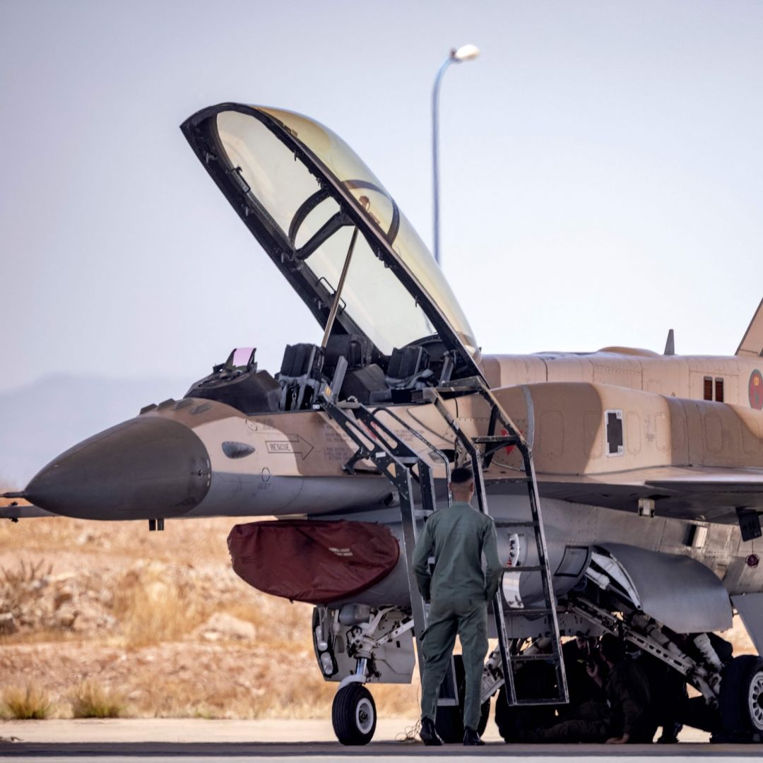 Moroccan Air Force mechanics examine an F-16 fighter jet at an airbase in Ben Guerir, about 58 kilometers north of Marrakesh, Morocco, on June 14, 2021. 