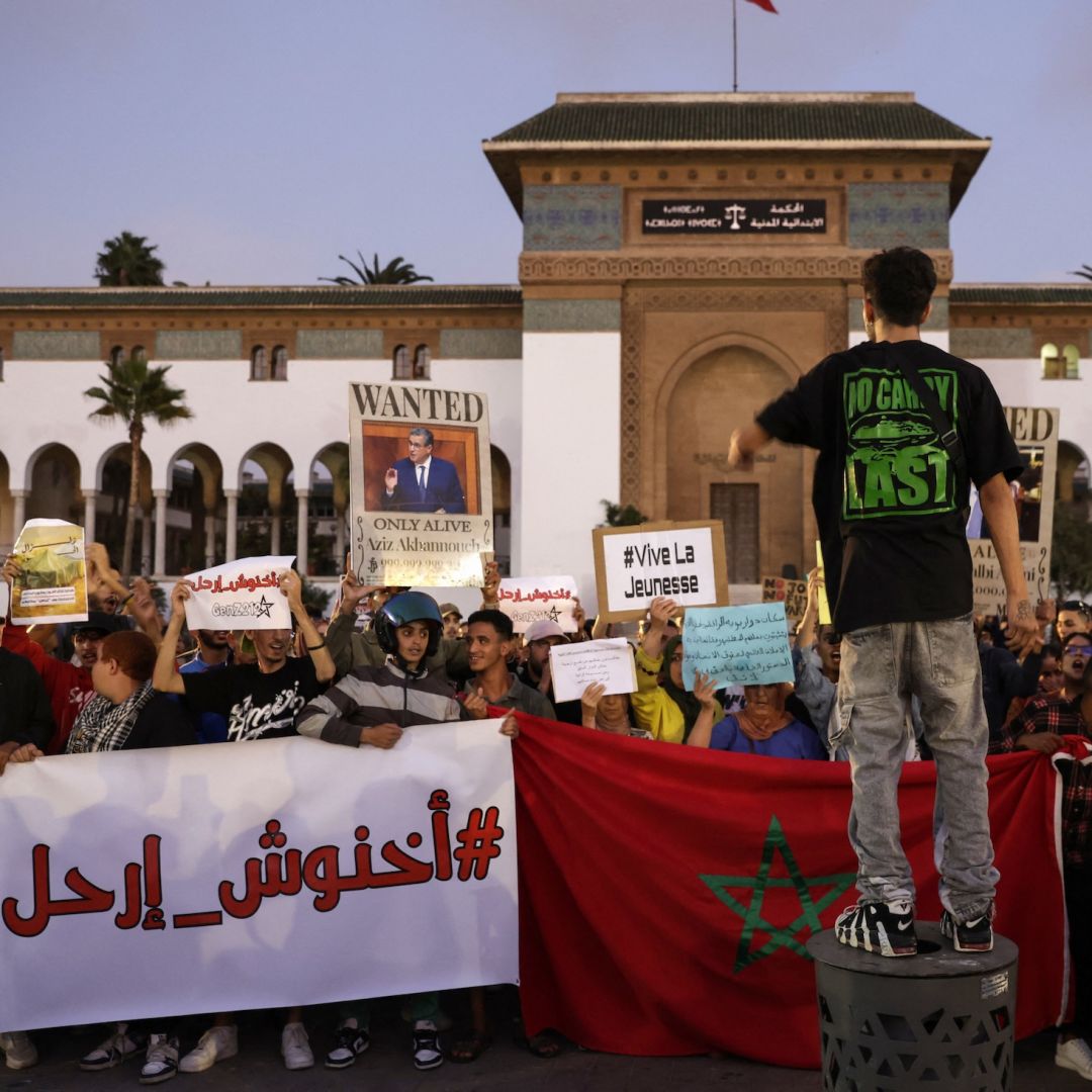Demonstrators lift banners during a youth-led protest demanding reforms to public healthcare and education in Casablanca, Morocco, on Oct. 6, 2025. Demonstrators lift banners during a youth-led protest demanding reforms to public healthcare and education in Casablanca, Morocco, on Oct. 6, 2025.