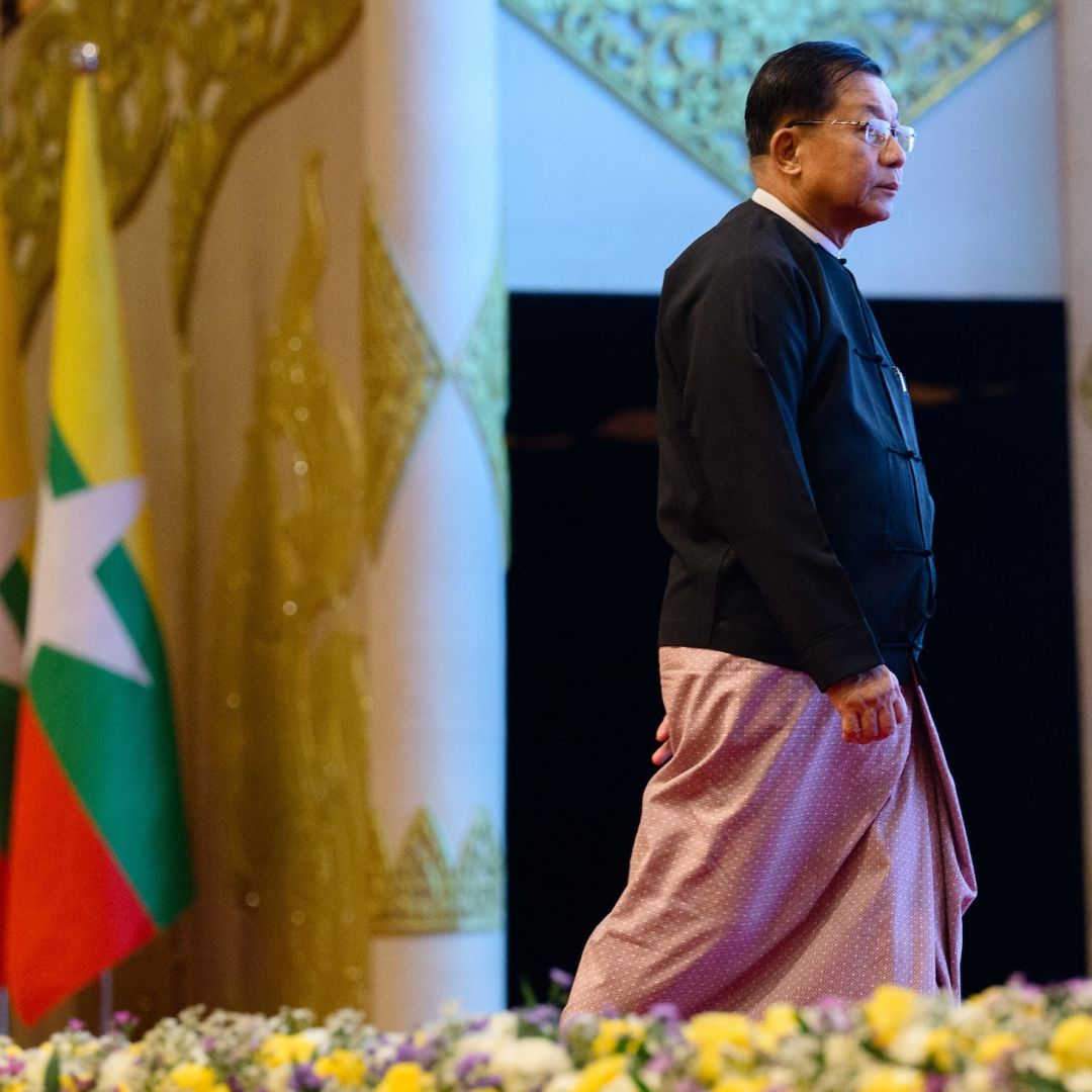 Myanmar's then-military chief Min Aung Hlaing prepares to deliver a speech during a memorial event at the Myanmar International Convention Center in Naypyidaw on March 28, 2026, to mark the first anniversary since a 7.7-magnitude tremor killed more than 3,800 people in Myanmar.