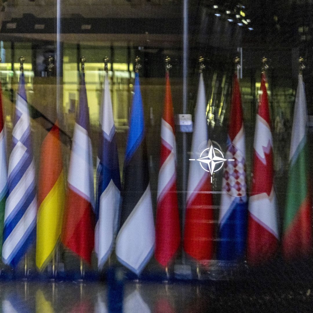 The NATO symbol and flags of some member countries Oct. 18 in Brussels.