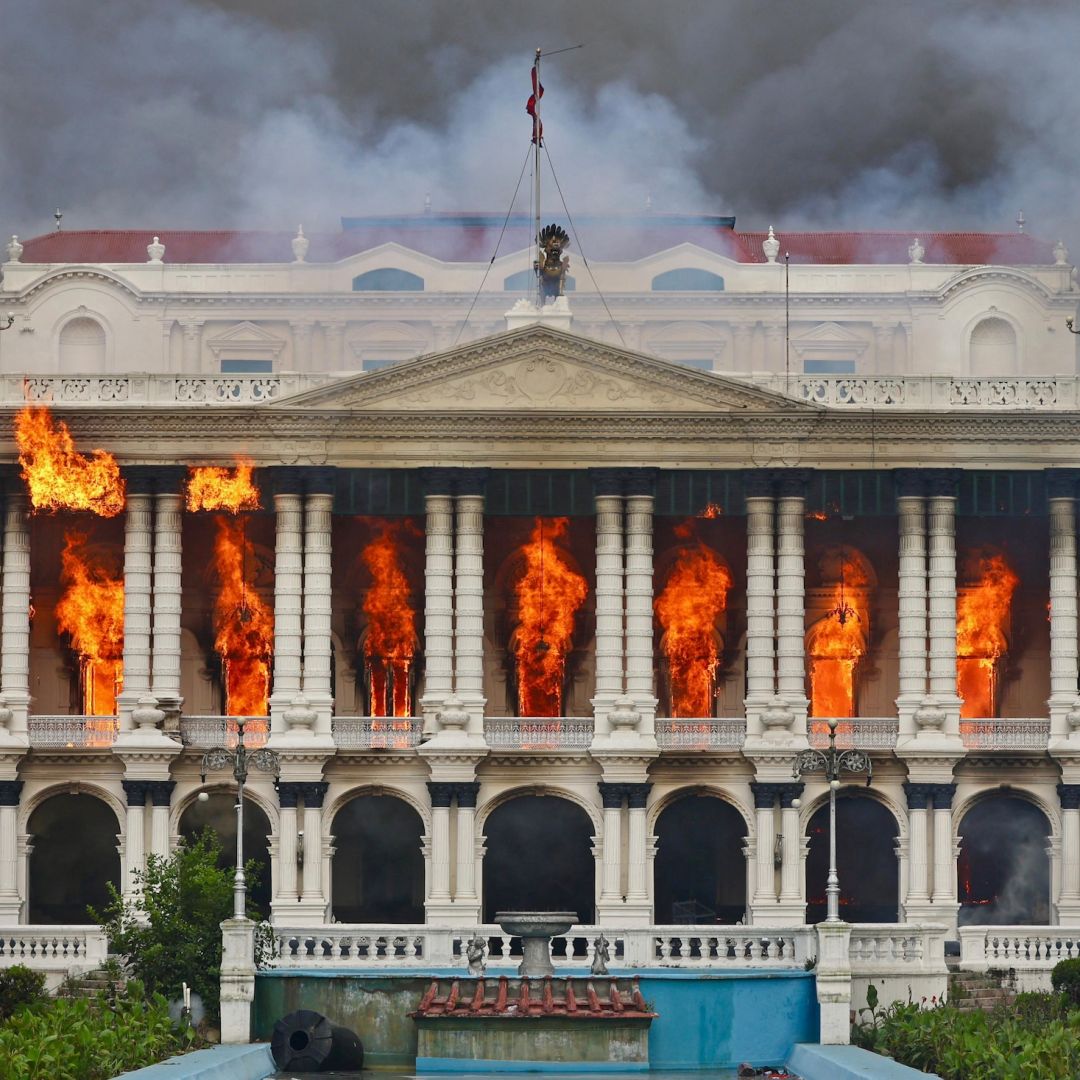 Fire rages through the Singha Durbar, the main administrative building for the Nepal government, in Kathmandu on Sept. 9, 2025, after youth protesters set fire to the building.  Fire rages through the Singha Durbar, the main administrative building for the Nepal government, in Kathmandu on Sept. 9, 2025, after youth protesters set fire to the building.