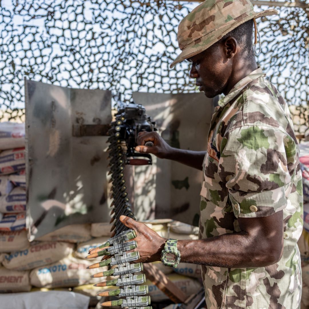 A Nigerian soldier stands guard at a checkpoint at the entrance to Monguno, Borno state, Nigeria, on July 4, 2025. 