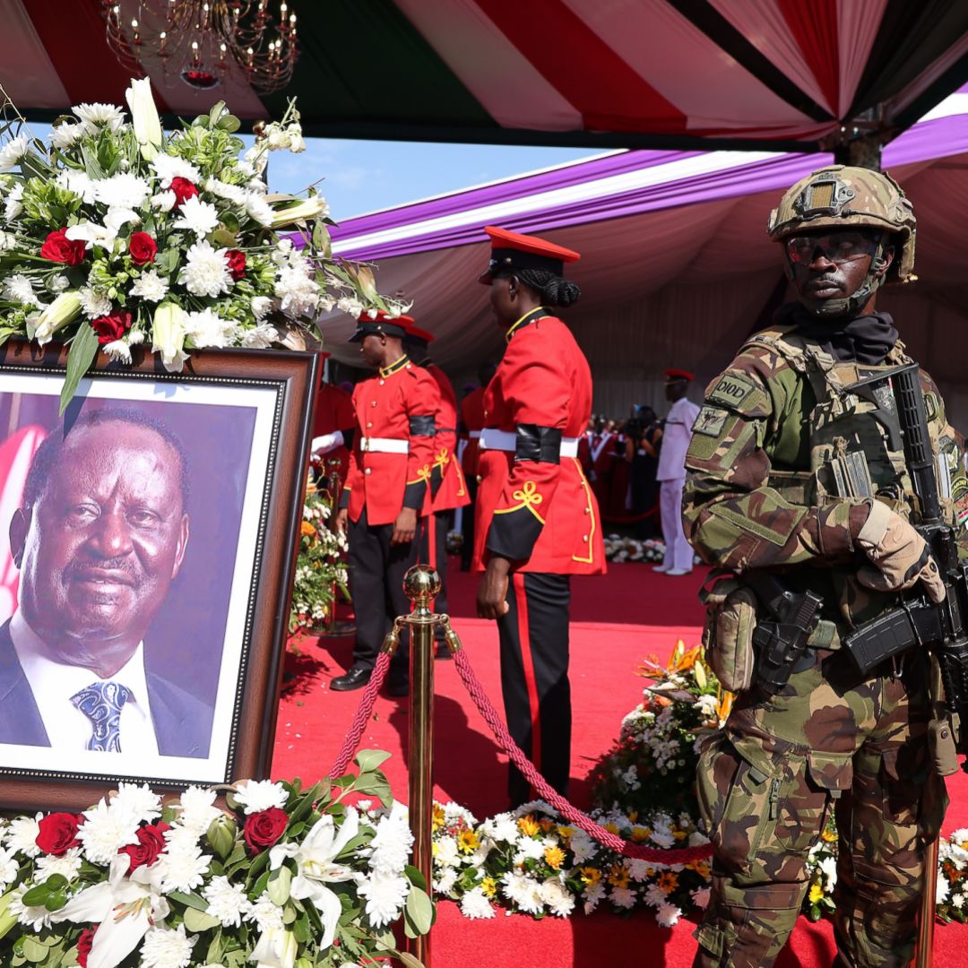 Kenyan forces stand next to the coffin of former Prime Minister Raila Odinga during a funeral mass at Jaramogi Oginga Odinga University of Science and Technology on October 19, 2025 in Bondo, Kenya. Kenyan forces stand next to the coffin of former Prime Minister Raila Odinga during a funeral mass at Jaramogi Oginga Odinga University of Science and Technology on October 19, 2025 in Bondo, Kenya.