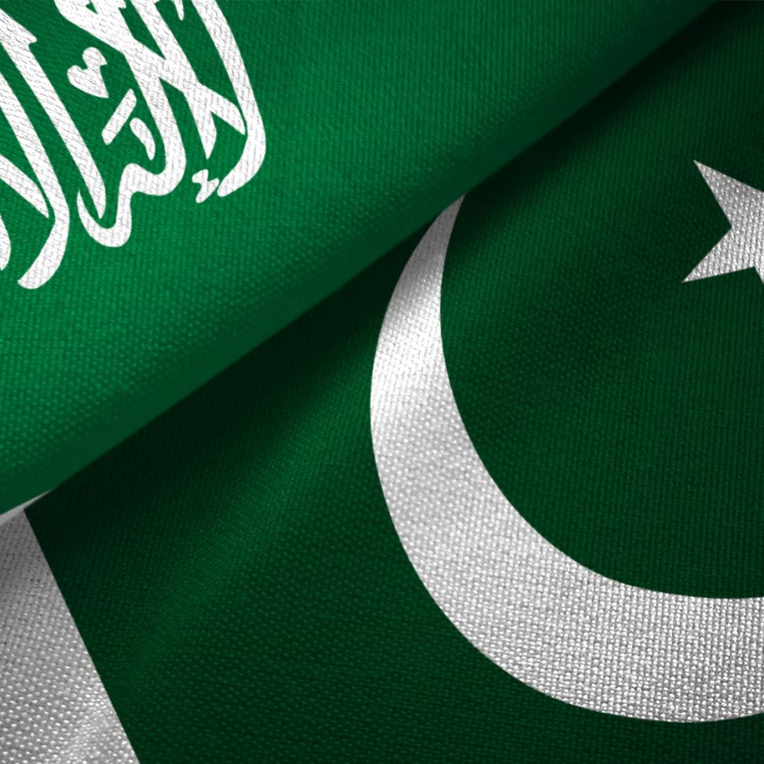 A digital illustration of Pakistan and Saudi Arabia’s national flags.