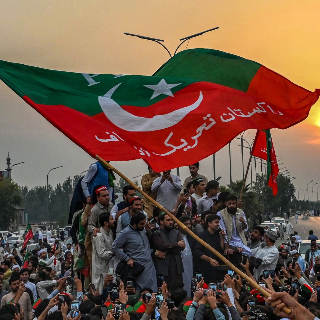 Supporters of former Pakistani Prime Minister Imran Khan take part in a protest as they block the main road in Peshawar, Pakistan, a day after the assassination attempt on Khan on Nov. 4, 2022. Supporters of former Pakistani Prime Minister Imran Khan take part in a protest as they block the main road in Peshawar, Pakistan, a day after the assassination attempt on Khan on Nov. 4, 2022.