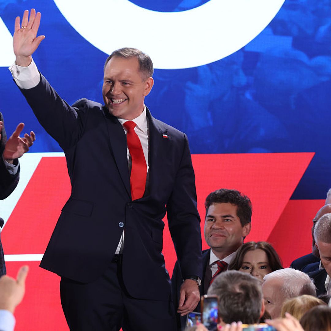 Right-wing opposition candidate Karol Nawrocki waves to supporters in Warsaw, Poland, following the presidential runoff election on June 1, 2025. Right-wing opposition candidate Karol Nawrocki waves to supporters in Warsaw, Poland, following the presidential runoff election on June 1, 2025.