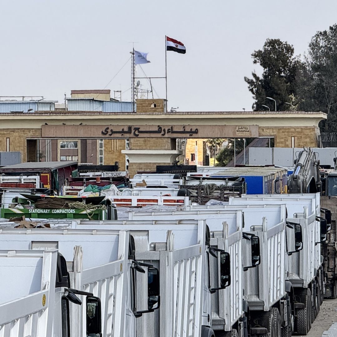 Egyptian trucks and heavy machinery on Oct. 26, 2025, on the Egyptian side of the Rafah border crossing with the Gaza Strip. Egyptian trucks and heavy machinery on Oct. 26, 2025, on the Egyptian side of the Rafah border crossing with the Gaza Strip.