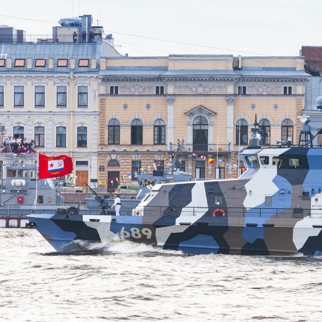 A Russian warship transits the Neva River in Saint Petersburg, Russia.