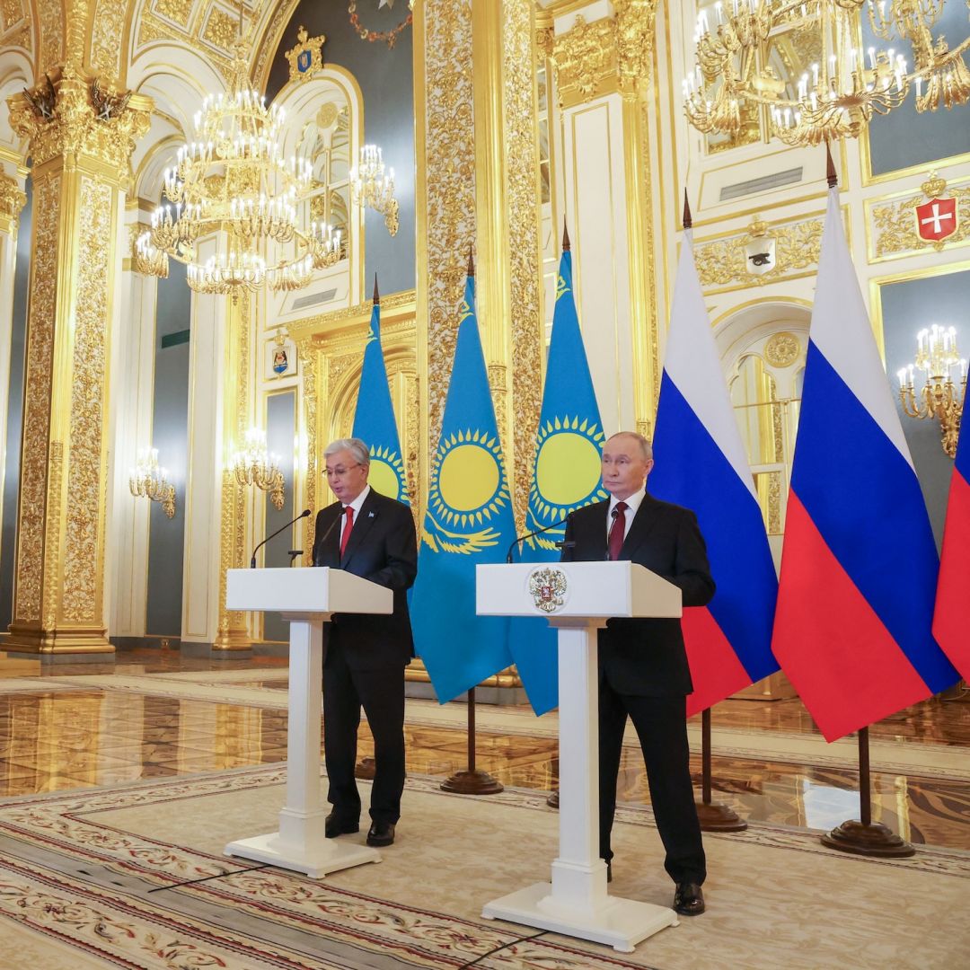 Russian President Vladimir Putin and Kazakh President Kassym-Jomart Tokayev address participants of the 21st Russia-Kazakhstan Interregional Cooperation Forum via a video link during their talks at the Kremlin in Moscow on Nov. 12, 2025. 