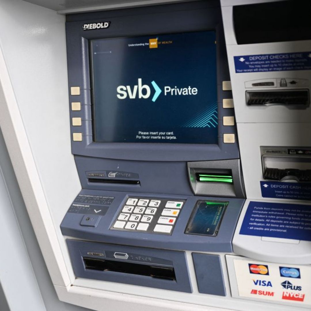 An SVB Private ATM outside of a Silicon Valley Bank branch March 20, 2023, in Santa Monica, California. Investor sentiment remains fragile and financial sector risks remain, so central banks may need to ease up on, or even reverse, monetary tightening in 2023. An SVB Private ATM outside of a Silicon Valley Bank branch March 20, 2023, in Santa Monica, California.
