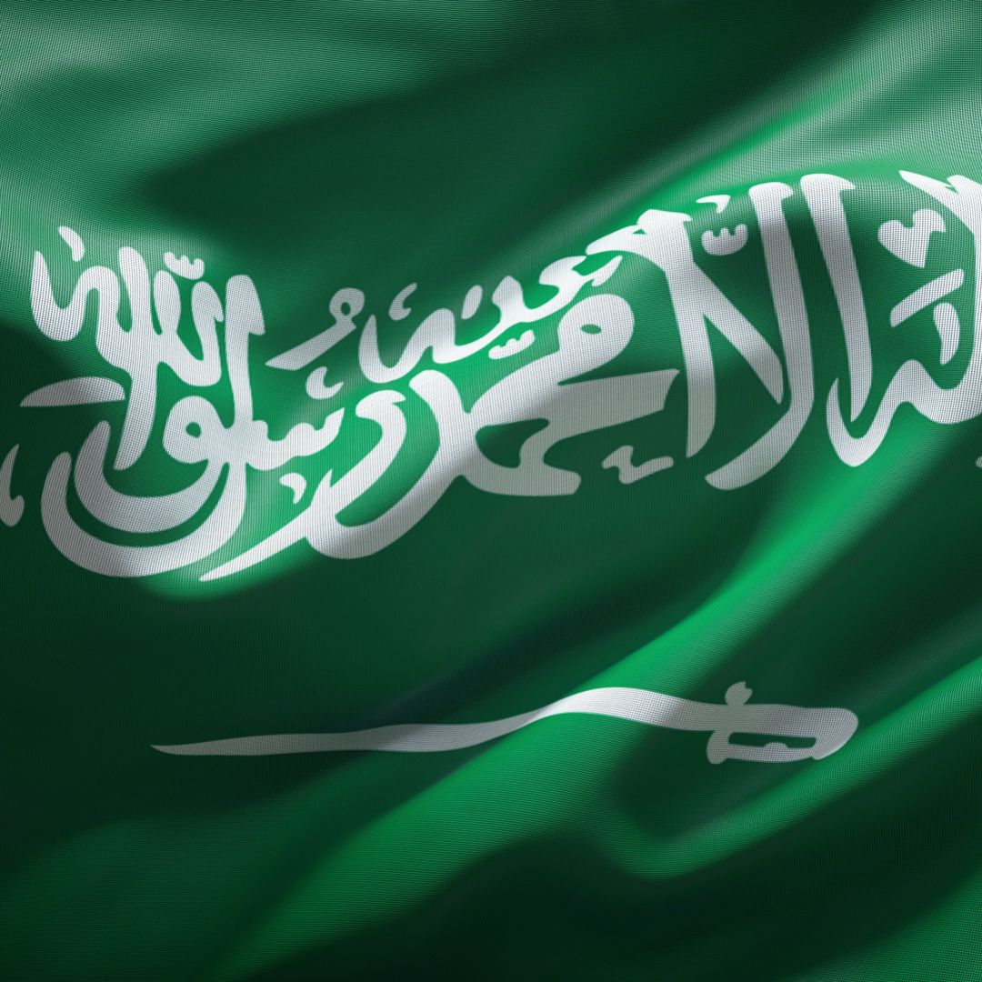 An image shows the national flag of Saudi Arabia.