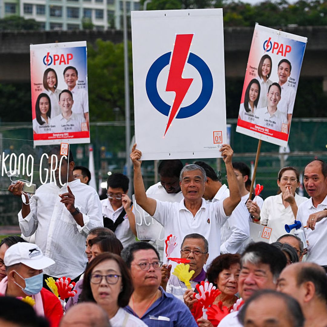 Supporters of Singapore's ruling People's Action Party attend an election rally on May 1, 2025. Supporters of Singapore's ruling People's Action Party attend an election rally on May 1, 2025.