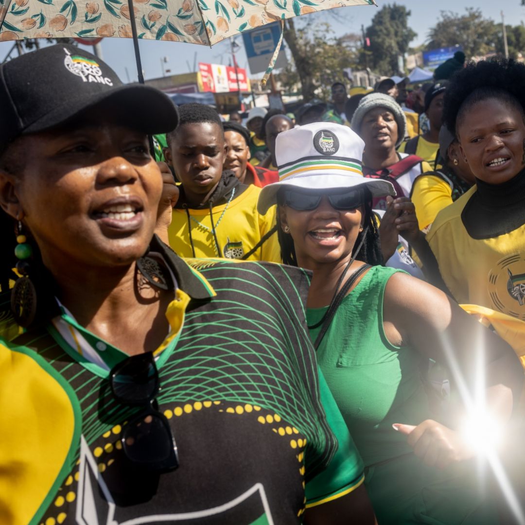 Supporters of the African National Congress (ANC) party dance, sing and chant slogans during a campaign march on May 24, 2024, in Johannesburg, South Africa. 