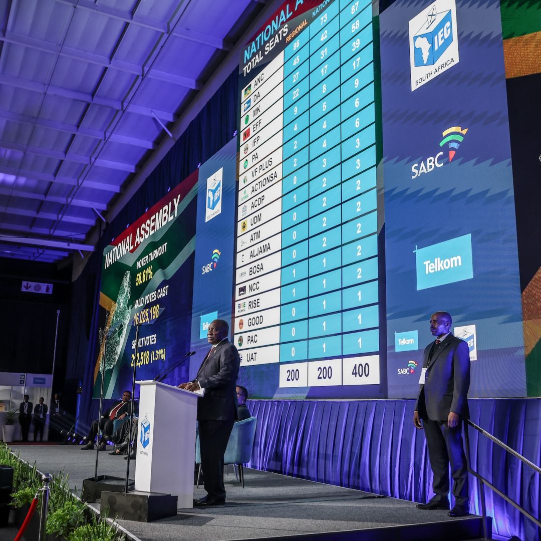 South African President and leader of the African National Congress (ANC) Cyril Ramaphosa (center) delivers his remarks after the official announcement of the results of South Africa's general election at the Gallagher Convention Centre in Midrand, on June 2, 2024. 