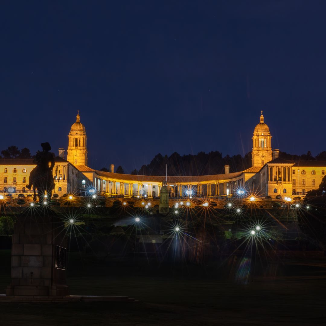 Photograph of the Union Buildings in Pretoria, Gauteng, South Africa, at night. 