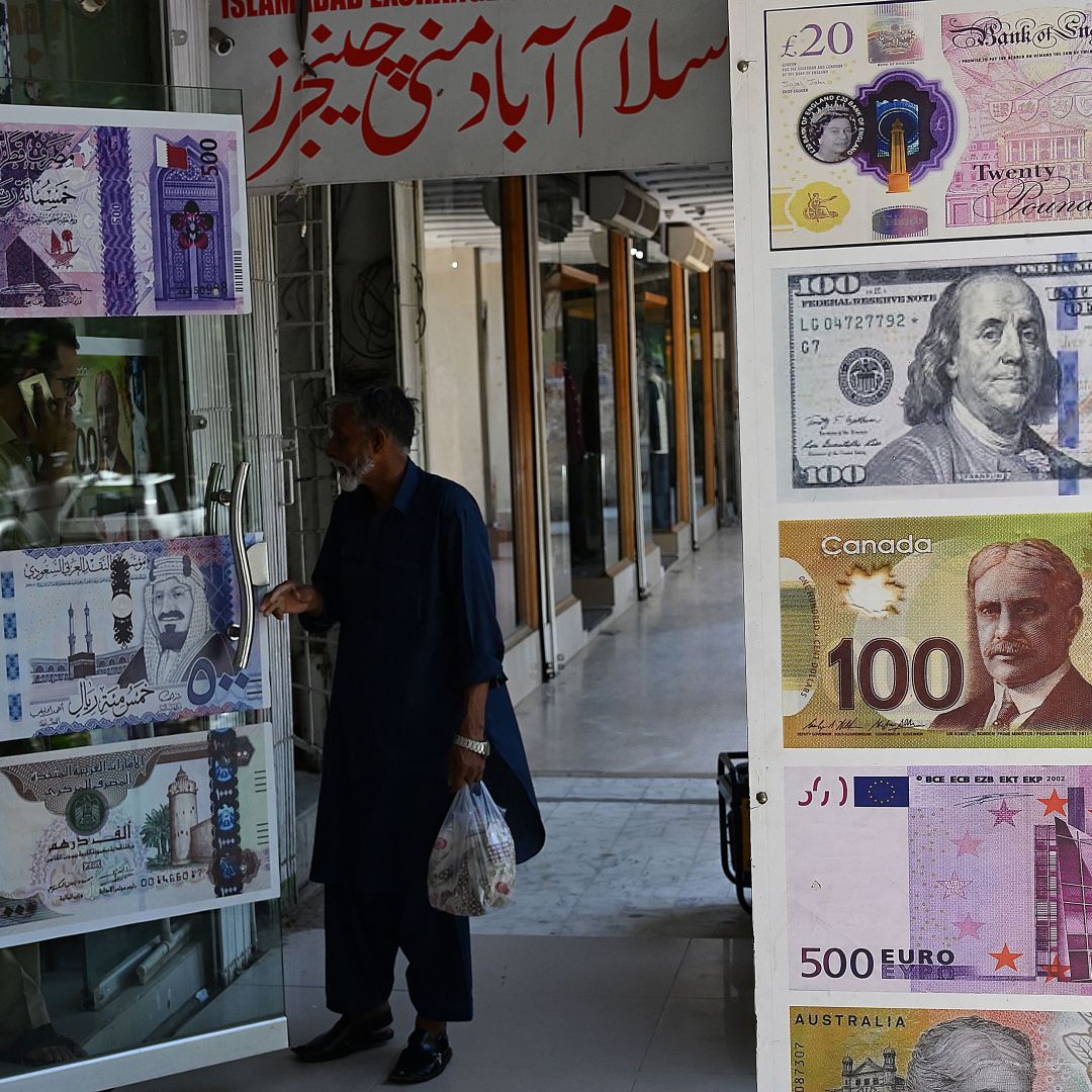 A man enters a foreign currency exchange shop in Islamabad, Pakistan, on July 11, 2023.