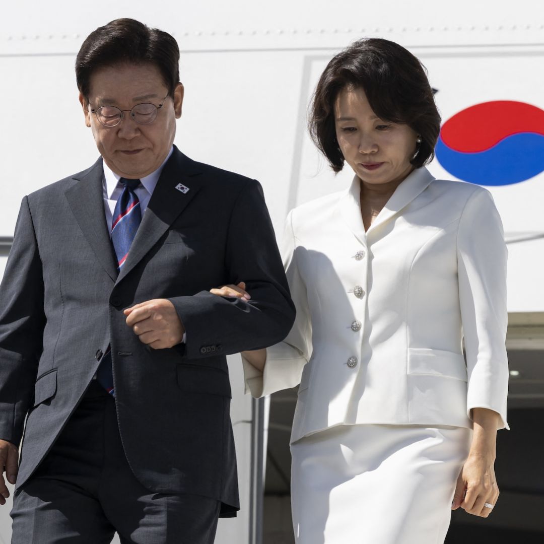 South Korean President Lee Jae Myung (left) and his wife disembark from the plane at Geneva Airport as they arrive to attend the G7 summit on June 16, 2026. South Korean President Lee Jae Myung (left) and his wife disembark from the plane at Geneva Airport as they arrive to attend the G7 summit on June 16, 2026.