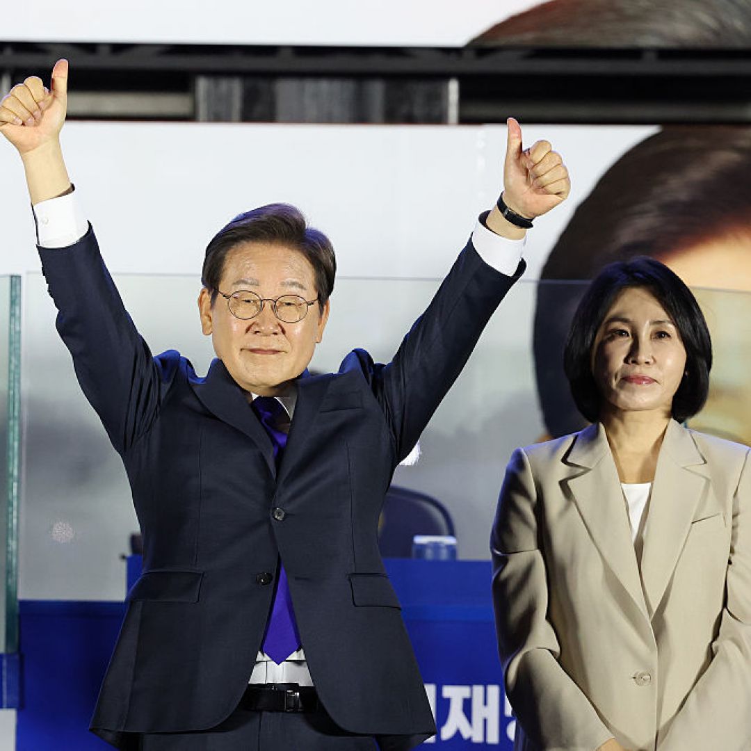 Lee Jae-myung and his wife celebrate his projected victory in South Korea's presidential election on June 4, 2025, in Seoul, South Korea.