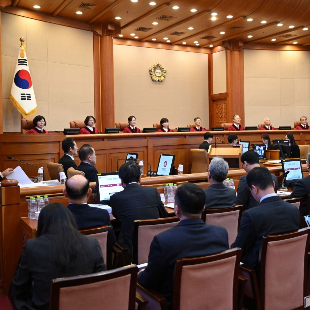 South Korean President Yoon Suk Yeol (second from right) attends the fifth hearing of his impeachment trial over his short-lived imposition of martial law at the Constitutional Court in Seoul on Feb. 4, 2025.