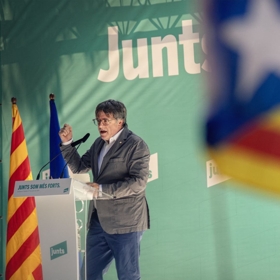 Carles Puigdemont, leader of Catalonia's pro-independence Junts party, delivers a speech in southwestern France on July 27, 2024, during a meeting held to celebrate the fourth anniversary of the party's founding.  Carles Puigdemont, leader of Catalonia's pro-independence Junts party, delivers a speech in southwestern France on July 27, 2024, during a meeting held to celebrate the fourth anniversary of the party's founding.