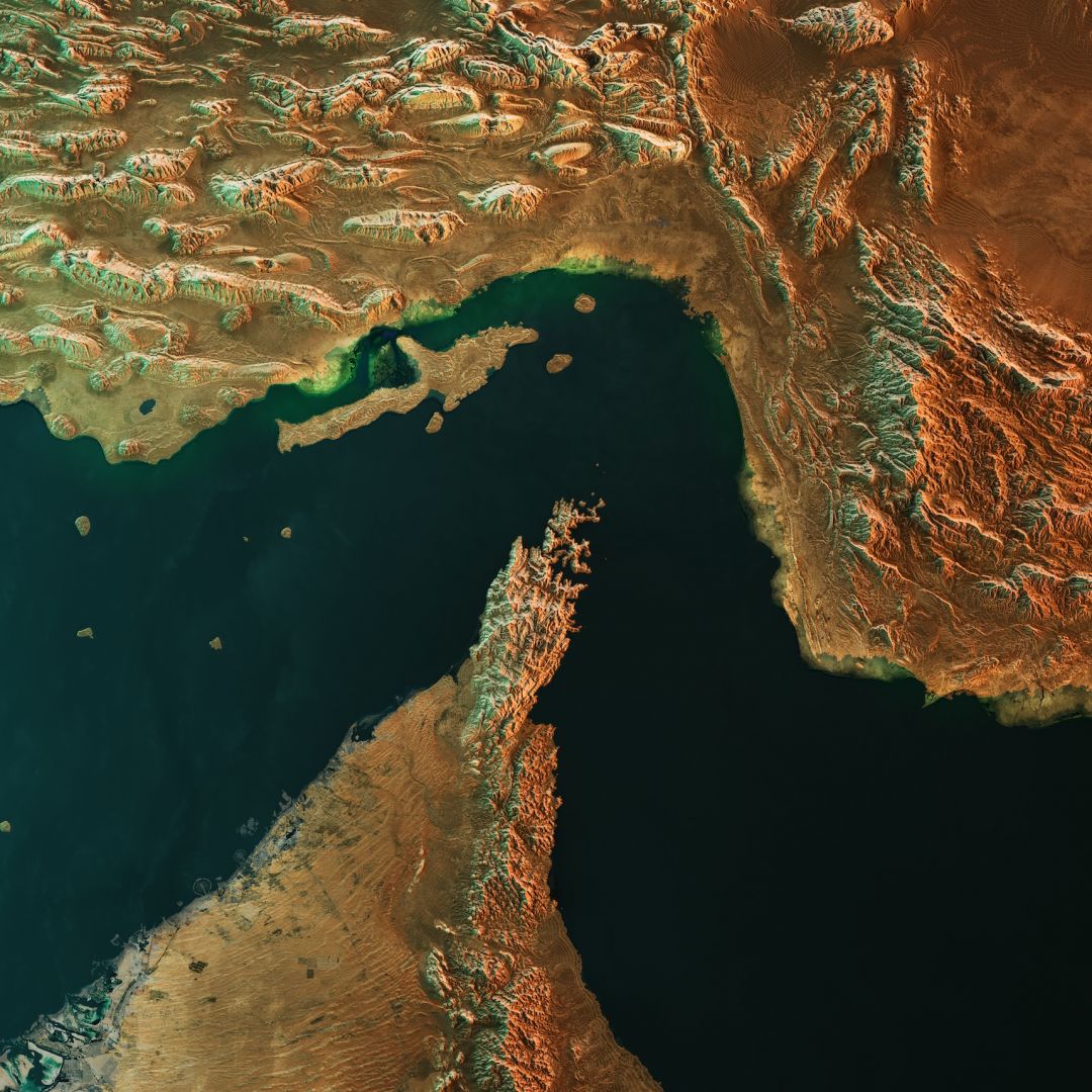 A 3D satellite-style visualization of the Strait of Hormuz in the Persian Gulf.