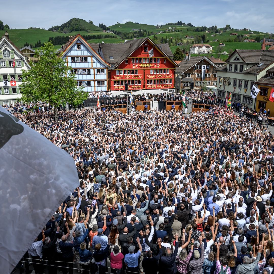 Citizens vote by raising their hands during the Landsgemeinde, a traditional public, non-secret ballot conducted by majority rule, in Appenzell, eastern Switzerland, on April 26. Citizens vote by raising their hands during the Landsgemeinde, a traditional public, non-secret ballot conducted by majority rule, in Appenzell, eastern Switzerland, on April 26.