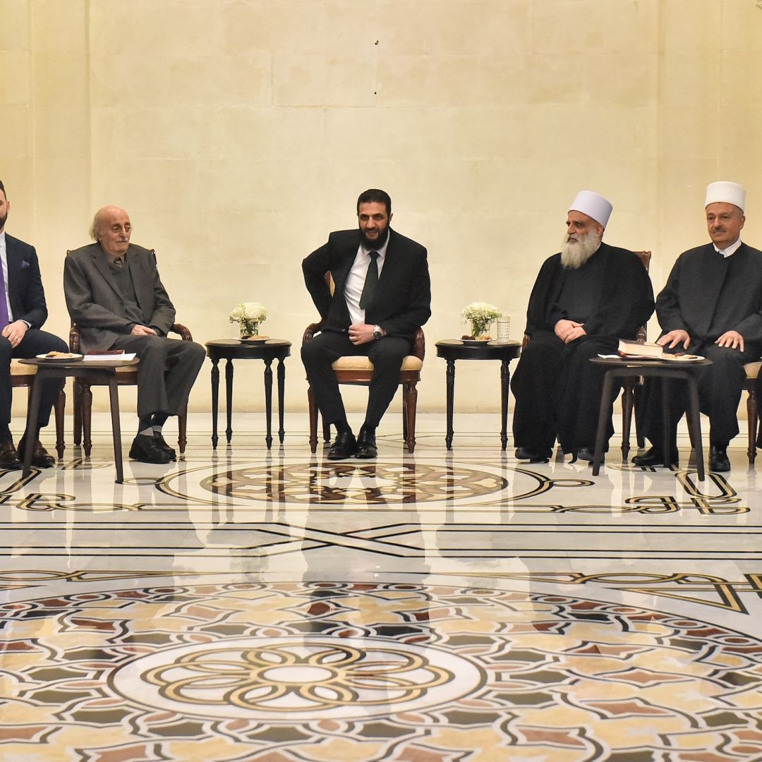 Walid Jumblatt, the Druze former leader of Lebanon's Progressive Socialist Party, and his son and current party head, Taymur Jumblatt, meet with Syrian leader Ahmed al-Sharaa, interim prime minister Mohammad al-Bashir and other Druze leaders during a Dec. 22 visit to Damascus, Syria.