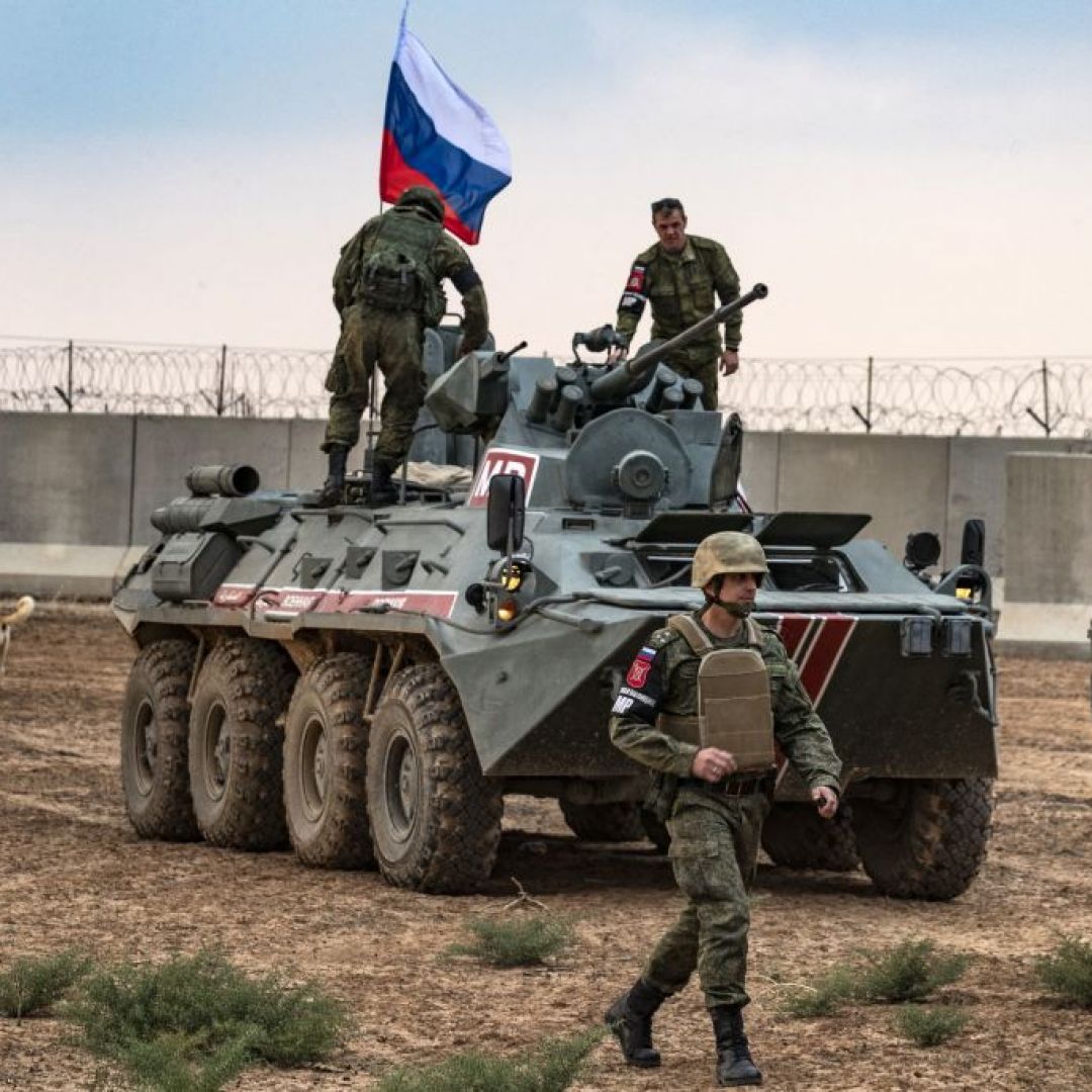 Russian troops gather around their military vehicles in northeast Syria on Nov. 1, 2019. 