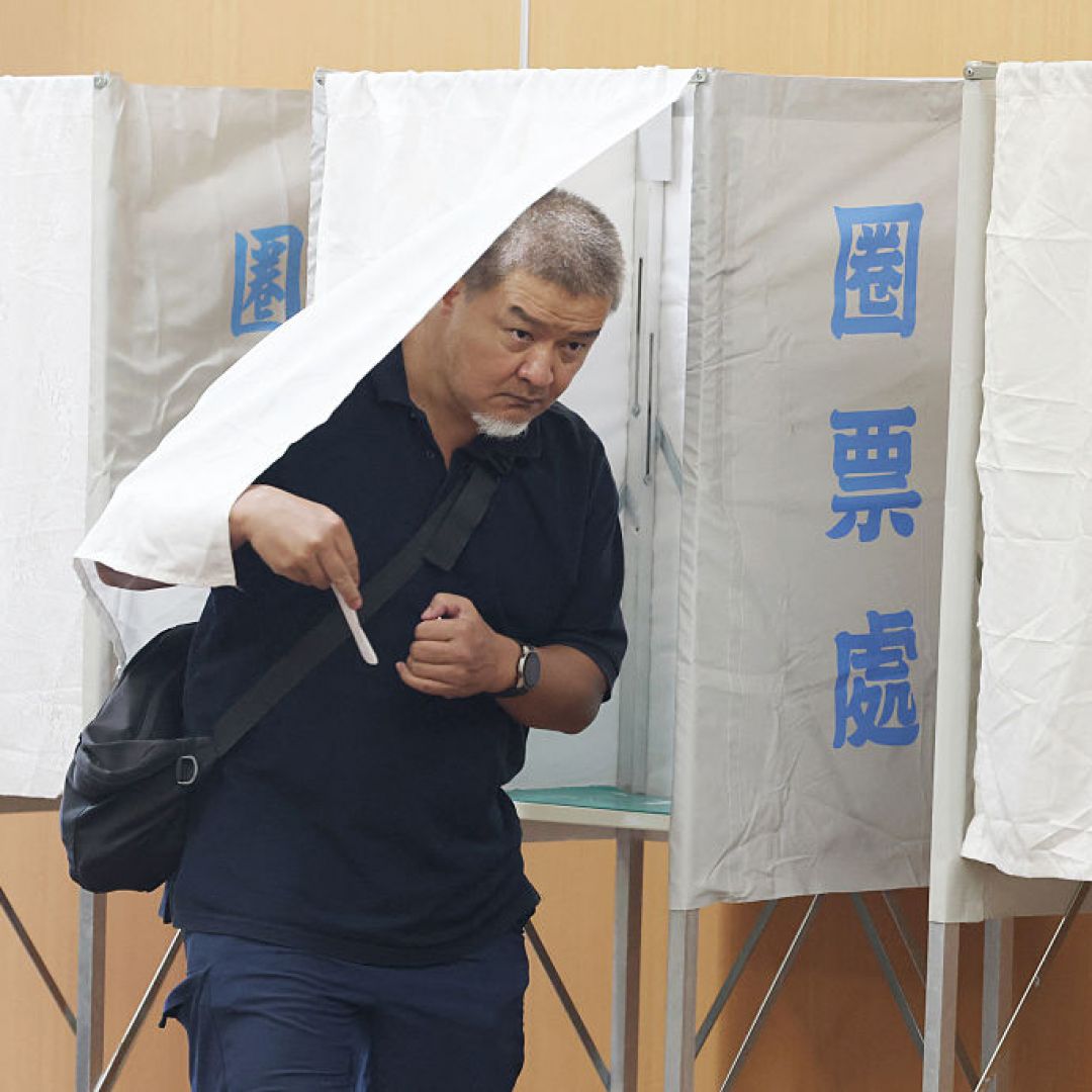A voter leaves a booth during voting for the recall election at a polling station in Taipei, Taiwan, on July 26, 2025. A voter leaves a booth during voting for the recall election at a polling station in Taipei, Taiwan, on July 26, 2025.