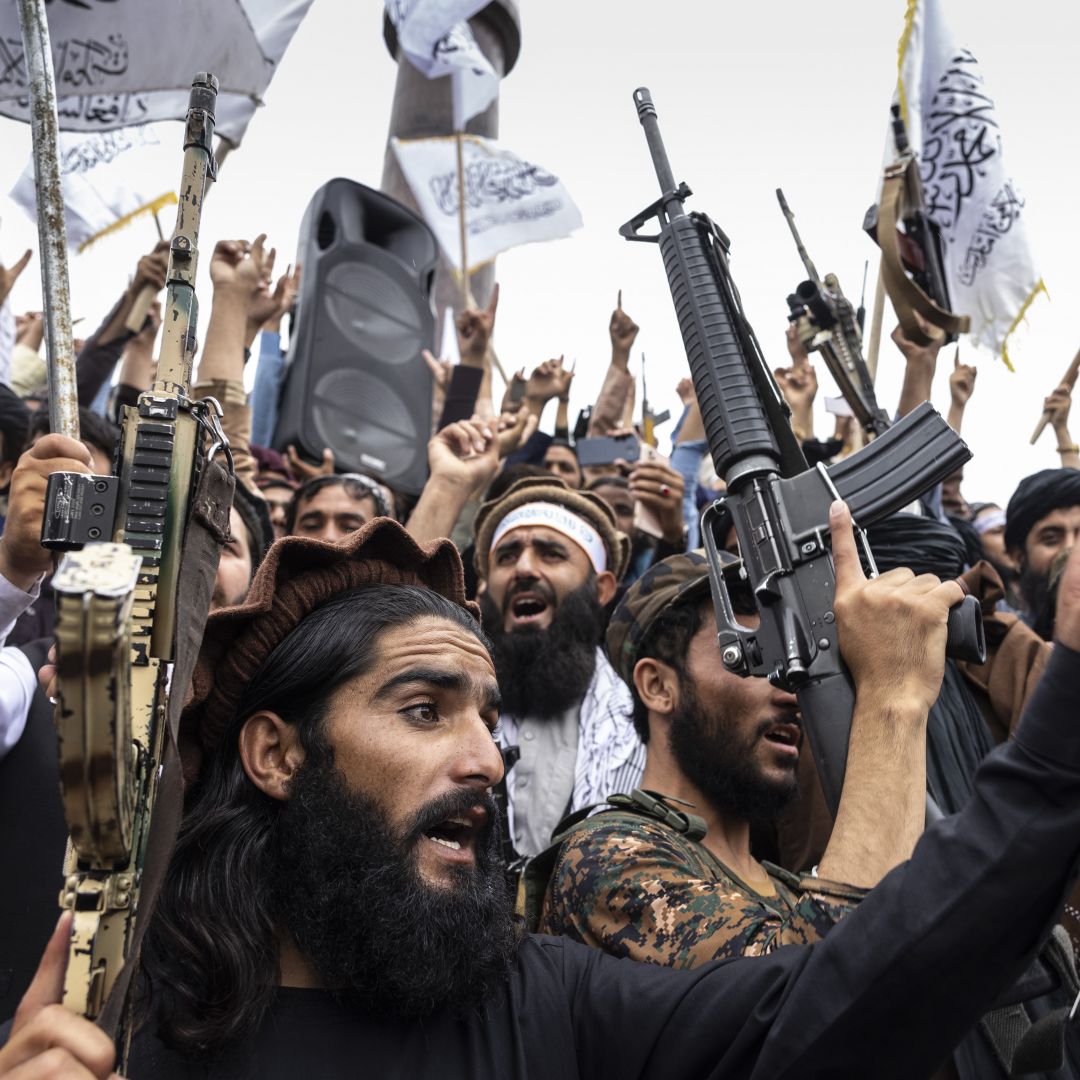 Taliban fighters take to the streets during a national holiday celebrating the first anniversary of the group’s takeover on Aug. 15, 2022, in Kabul, Afghanistan. Taliban fighters take to the streets during a national holiday celebrating the first anniversary of the group’s takeover on Aug. 15, 2022, in Kabul, Afghanistan.