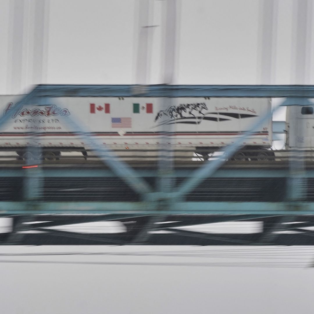 A truck crosses the Ambassador Bridge from Windsor, Ontario, to Detroit, Michigan, on Jan. 31, 2025. 