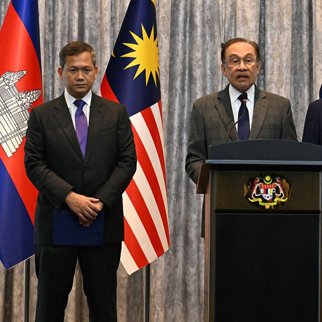 Malaysian Prime Minister Anwar Ibrahim (center) speaks during a press conference next to Cambodian Prime Minister Hun Manet (left) and Thailand's acting prime minister Phumtham Wechayachai (right) in Putrajaya, Malaysia, on July 28, 2025. Malaysian Prime Minister Anwar Ibrahim (center) speaks during a press conference next to Cambodian Prime Minister Hun Manet (left) and Thailand's acting prime minister Phumtham Wechayachai (right) in Putrajaya, Malaysia, on July 28, 2025.