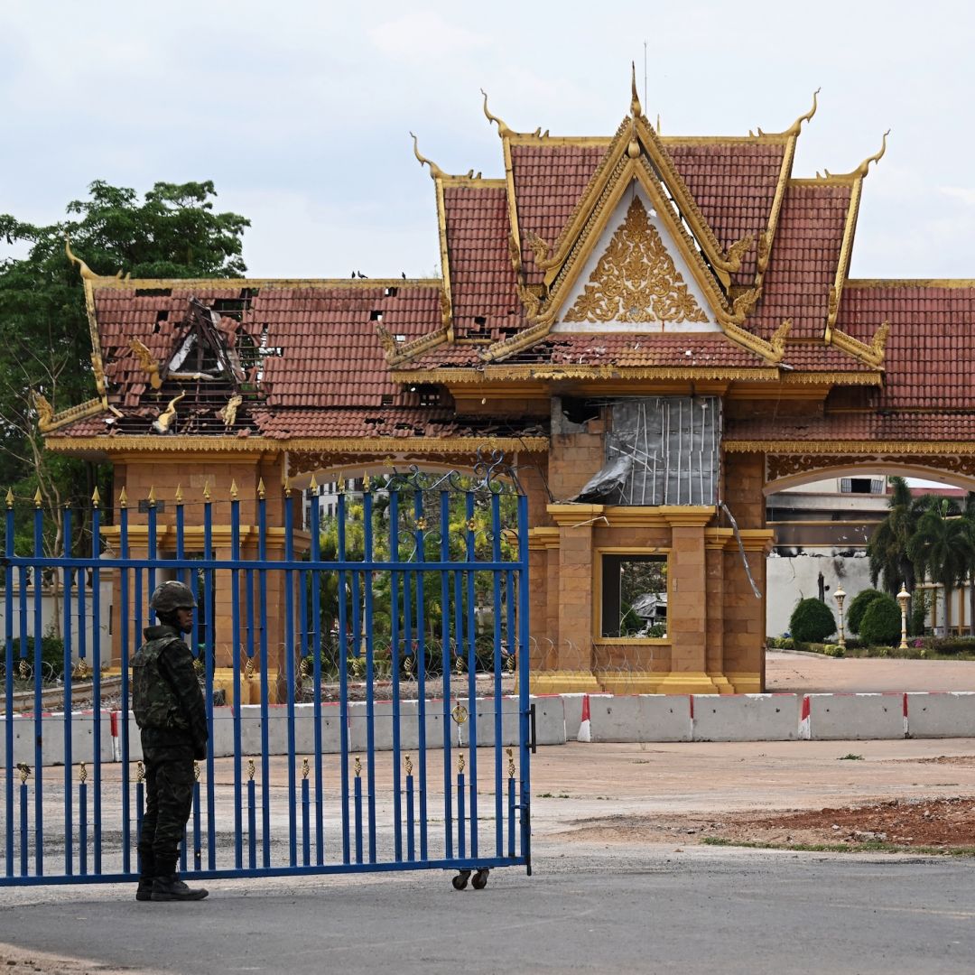 A Thai soldier stands guard at a damaged border crossing point between Surin province's Chong Chom and O'Smach town on the Thai-Cambodian border, on March 12, 2026. A Thai soldier stands guard at a damaged border crossing point between Surin province's Chong Chom and O'Smach town on the Thai-Cambodian border, on March 12, 2026.