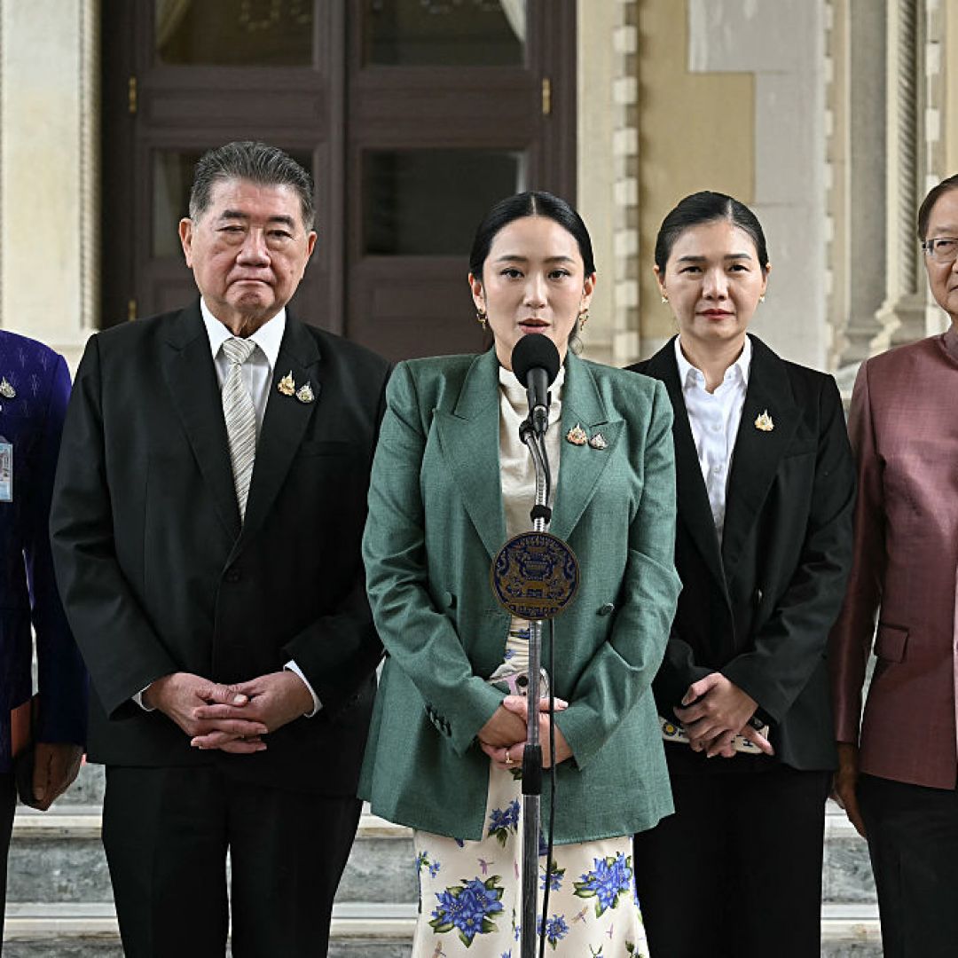 Thai Prime Minister Paetongtarn Shinawatra (center) speaks next to Deputy Prime Minister Phumtham Wechayachai (2nd from left) during a press conference in Bangkok following her suspension by the country's Constitutional Court on July 1, 2025. 