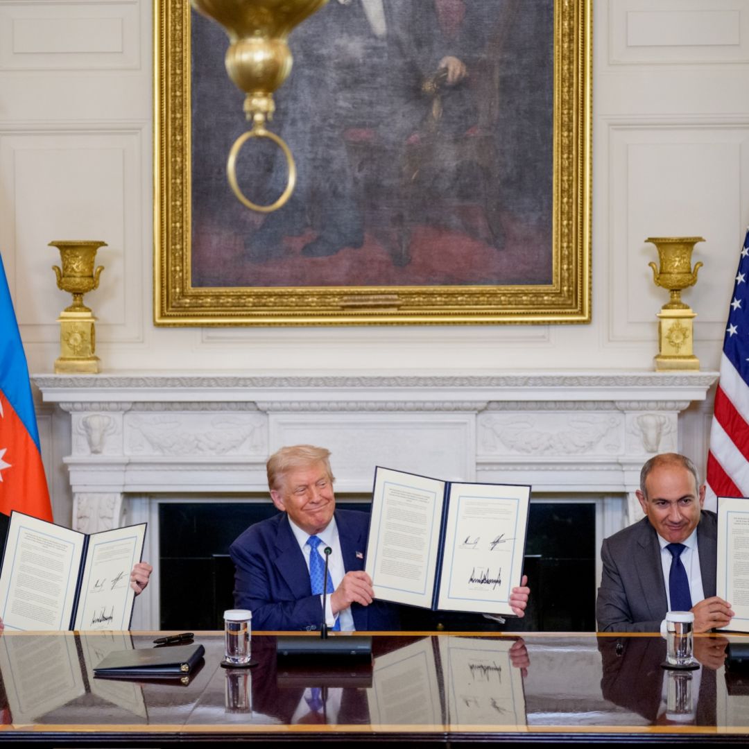 U.S. President Donald Trump (center), Azerbaijani President Ilham Aliyev (left) and Armenian Prime Minister Nikol Pashinyan (right) hold up an agreement signed during a ceremony at the White House on Aug. 8, 2025. U.S. President Donald Trump (center), Azerbaijani President Ilham Aliyev (left) and Armenian Prime Minister Nikol Pashinyan (right) hold up an agreement signed during a ceremony at the White House on Aug. 8, 2025.