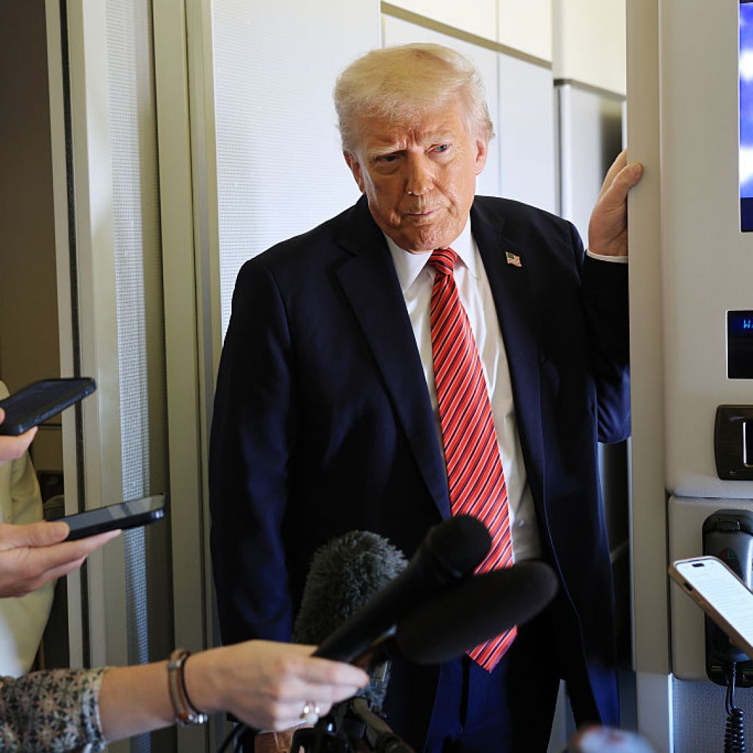 U.S. President Donald Trump talks to reporters aboard Air Force One on May 14, 2025, as he flies to Doha, Qatar, for his first trip to the Middle East since returning to the White House. U.S. President Donald Trump talks to reporters aboard Air Force One on May 14, 2025, as he flies to Doha, Qatar, for his first trip to the Middle East since returning to the White House.