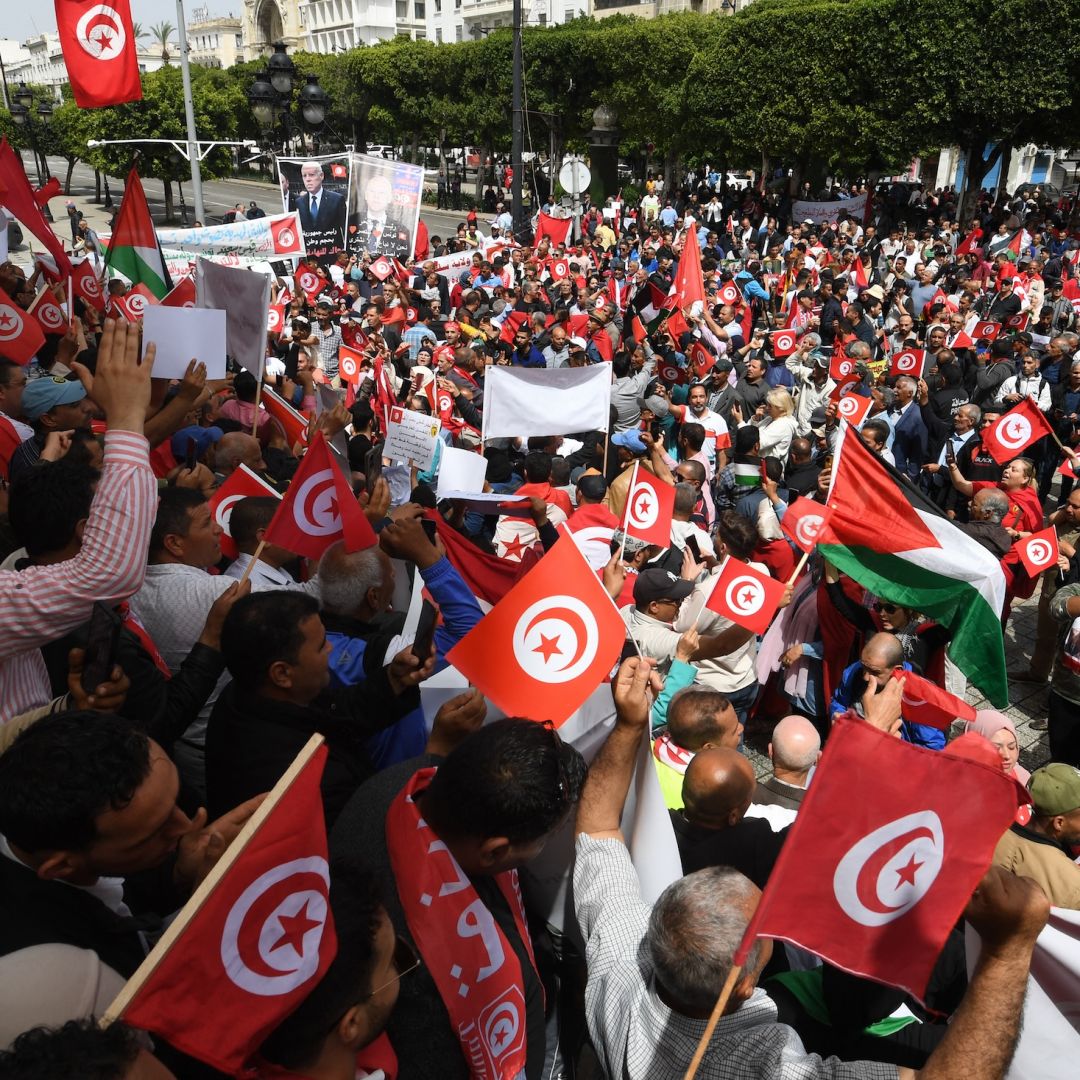 Supporters of Tunisian President Kais Saied participate in a rally rejecting foreign interference in the country's internal affairs in Tunis, Tunisia, on May 19, 2024. 
