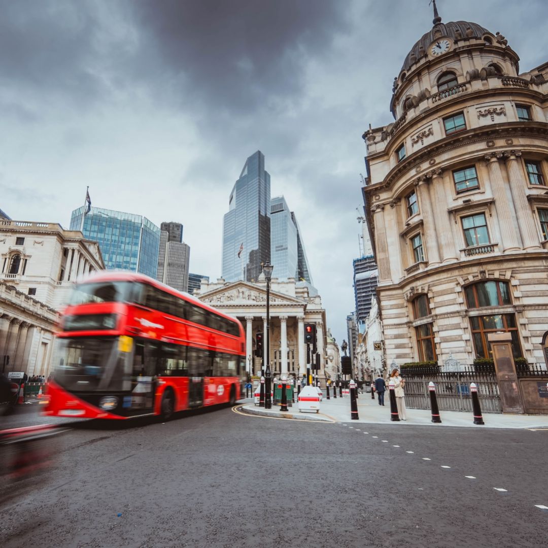 A stock photo shows a street scene in the financial district of London. 