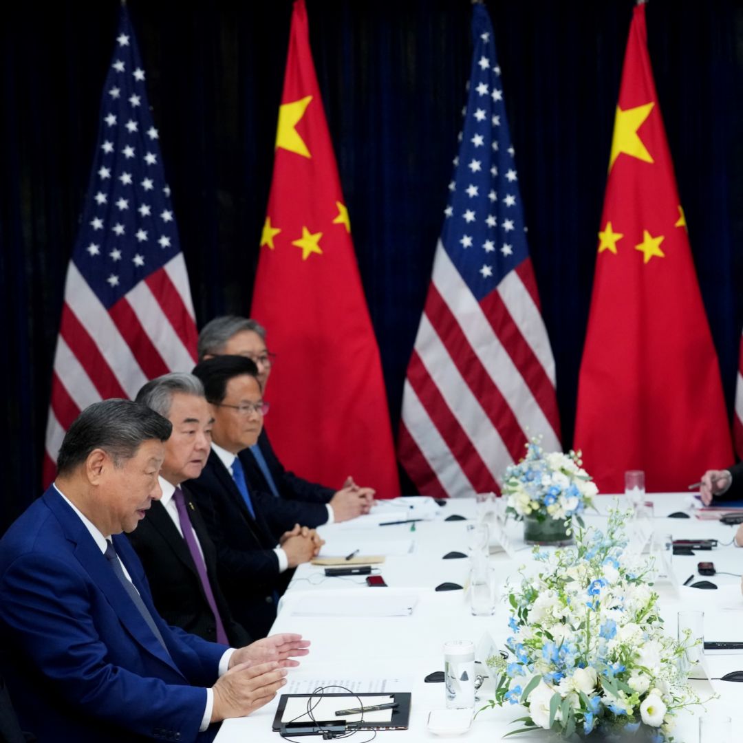 U.S. President Donald Trump (right) and Chinese President Xi Jinping attend a bilateral meeting in Busan, South Korea, on Oct. 30, 2025.