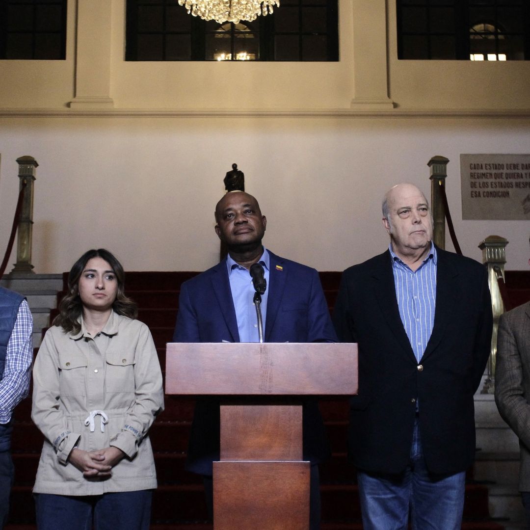 Colombian Foreign Relations Minister Luis Gilberto Murillo (C) looks on with other Colombian officials during a Jan. 26 press conference on a diplomatic dispute with the United States at the San Carlos Palace in Bogota, Colombia. 