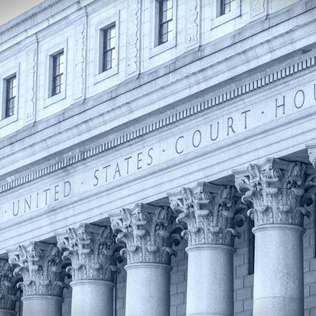 A U.S. courthouse facade with columns in lower Manhattan, New York. A U.S. courthouse facade with columns in lower Manhattan, New York.