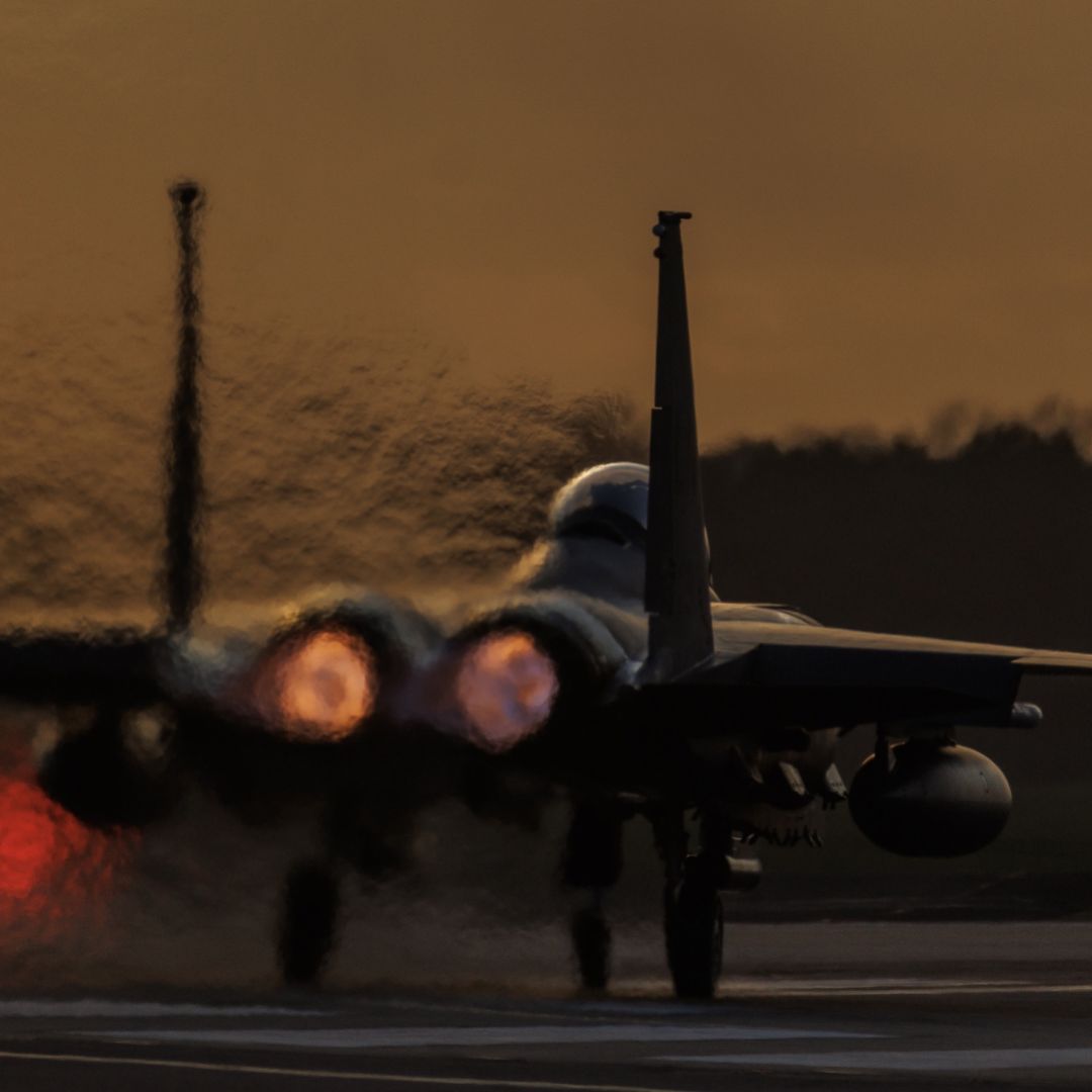 An F-15 fighter plane takes off from RAF Lakenheath at sunset on Jan. 7, 2026 in Mildenhall, the United Kingdom.