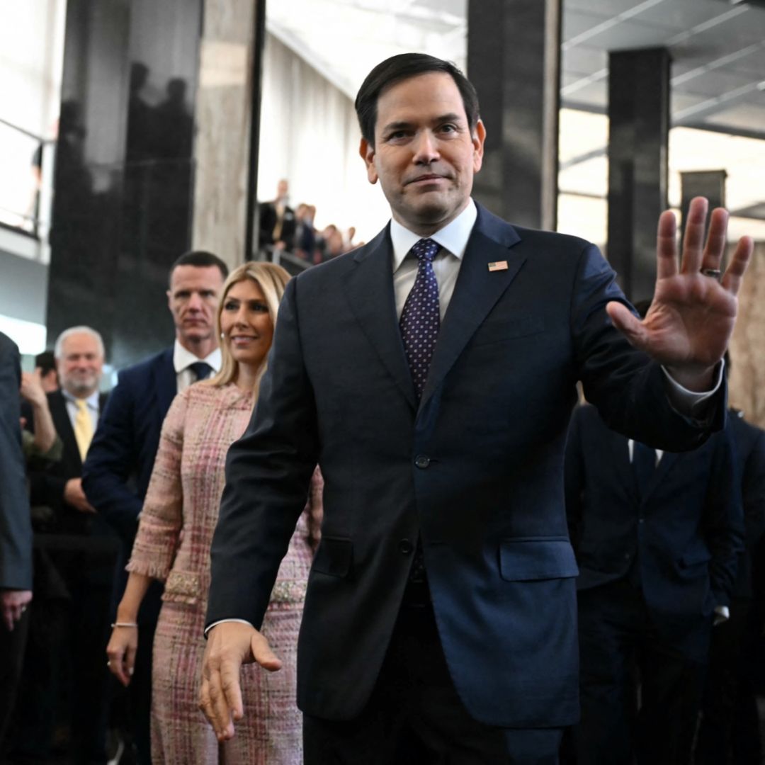 U.S. Secretary of State Marco Rubio and his wife Jeanette Rubio arrive at the State Department in Washington, D.C., to speak to employees on Jan. 21, 2025. 