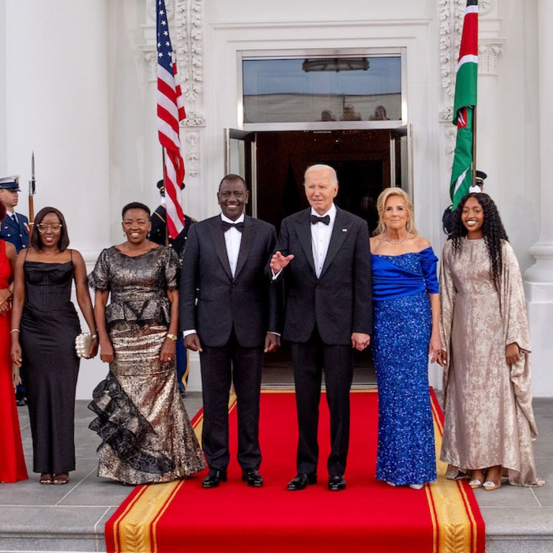 U.S. President Joe Biden and First Lady Jill Biden pose with Kenyan President William Ruto (center), alongside his wife and children, as they arrive for a State Dinner at the White House on May 23, 2024. 