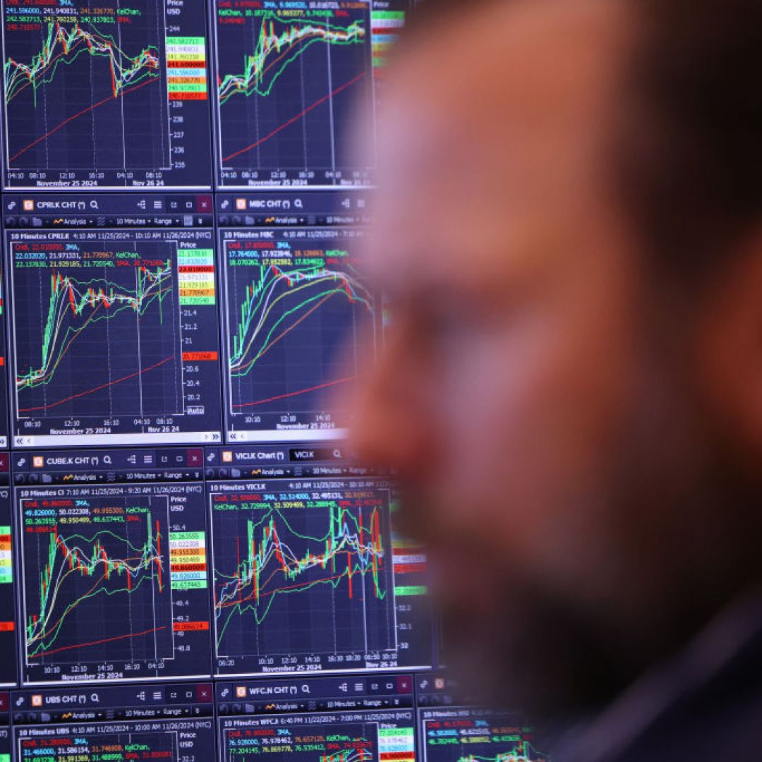 NYSE workers during morning trading Nov. 26 in New York.