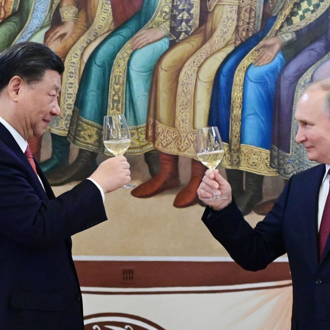 Russian President Vladimir Putin and Chinese President Xi Jinping make a toast during a reception following their talks at the Kremlin in Moscow, Russia, on March 21, 2023.