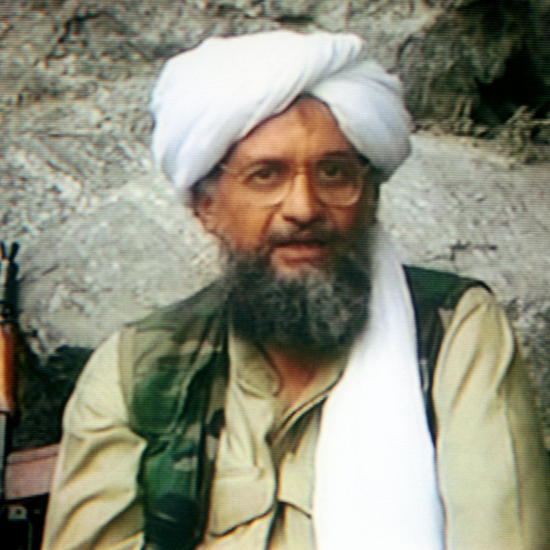 Ayman al-Zawahiri is seen on a television screen during a broadcast report. 