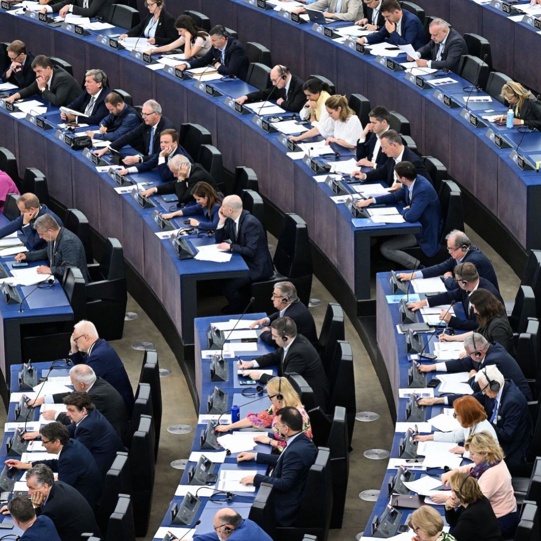 Members of the European Parliament take part in voting on the Artificial Intelligence Act during a plenary session at the European Parliament.